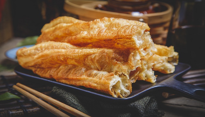 做梦梦见吃油条是什么意思