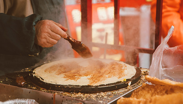 做梦梦见吃煎饼是什么意思